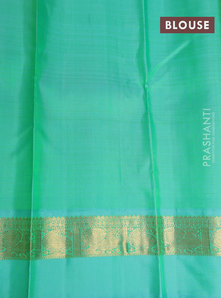 Pure kanchipuram silk saree yellow and teal blue with zari woven buttas and zari woven simple border