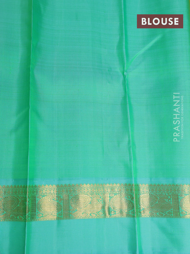 Pure kanchipuram silk saree yellow and teal blue with zari woven buttas and zari woven simple border