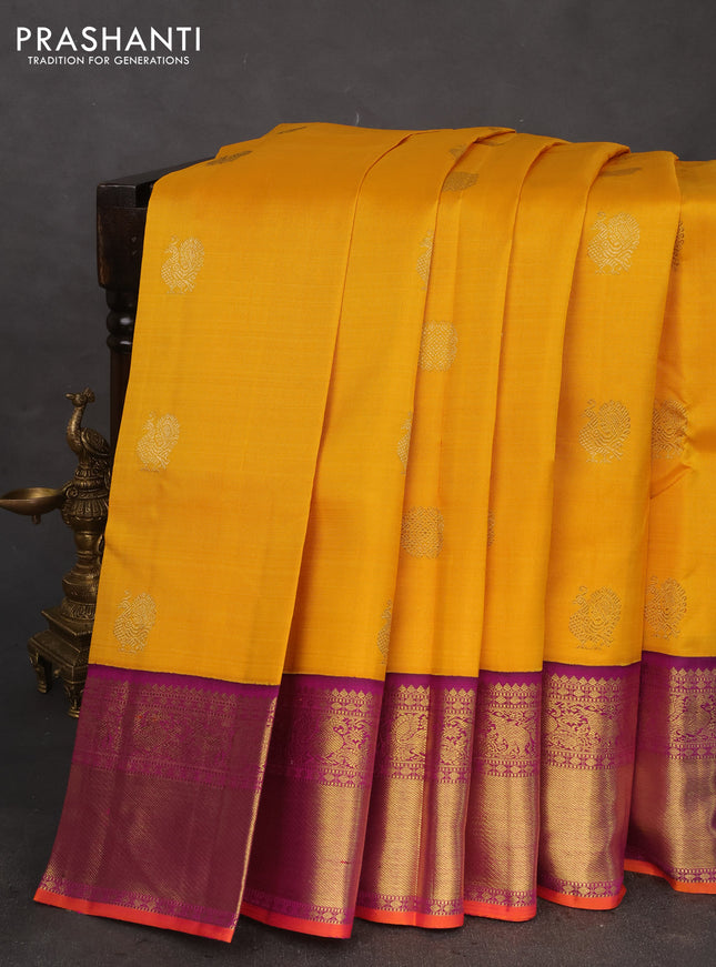 Pure kanchipuram silk saree yellow and purple with zari woven buttas and rich zari woven korvai border