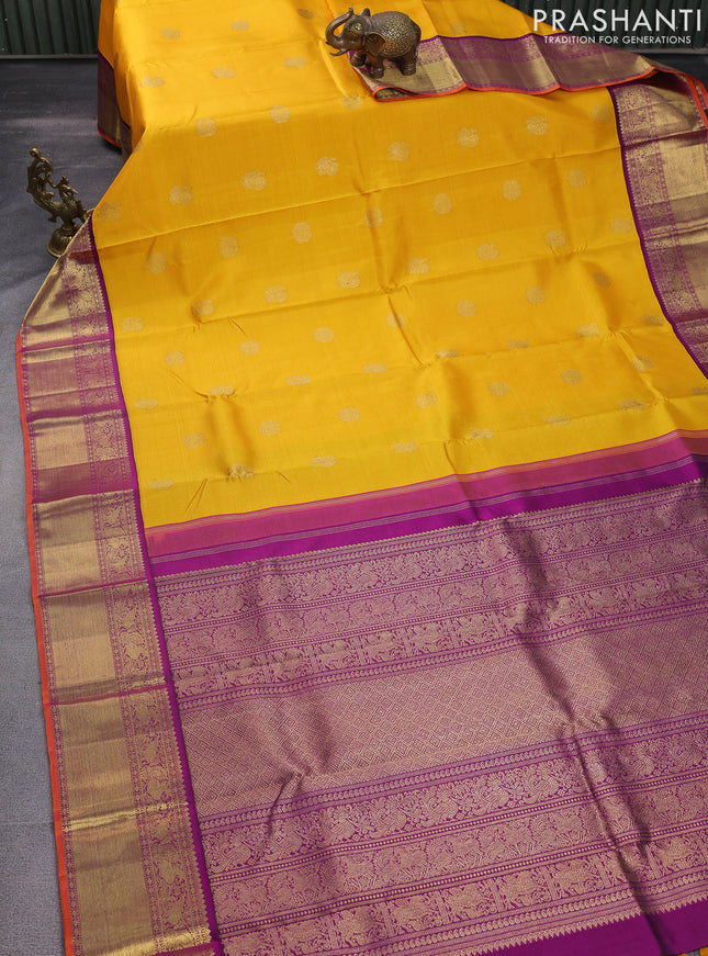 Pure kanchipuram silk saree yellow and purple with zari woven buttas and rich zari woven korvai border