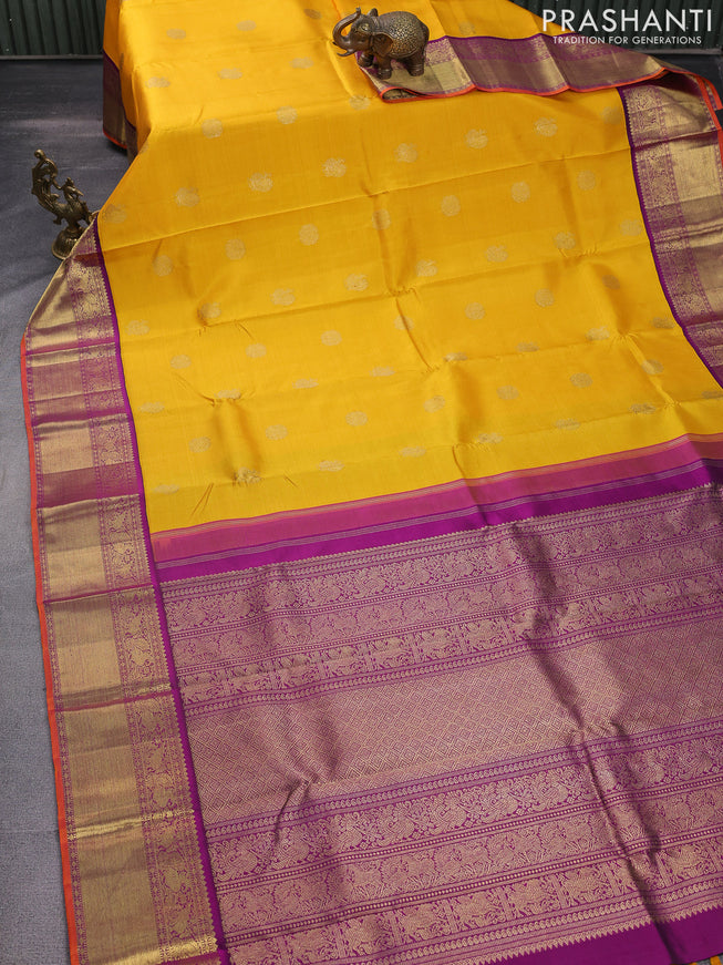 Pure kanchipuram silk saree yellow and purple with zari woven buttas and rich zari woven korvai border