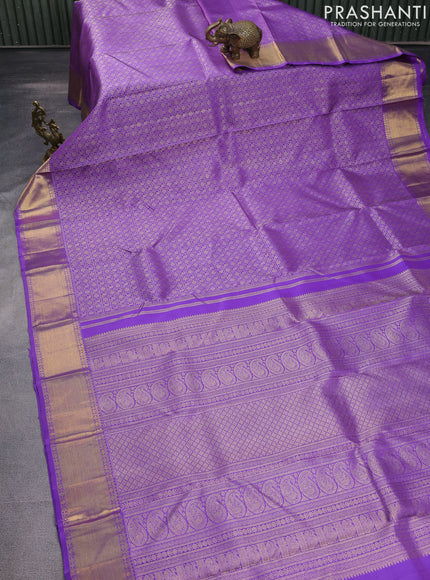 Pure kanchipuram silk saree lavender with allover zari woven brocade weaves and zari woven border
