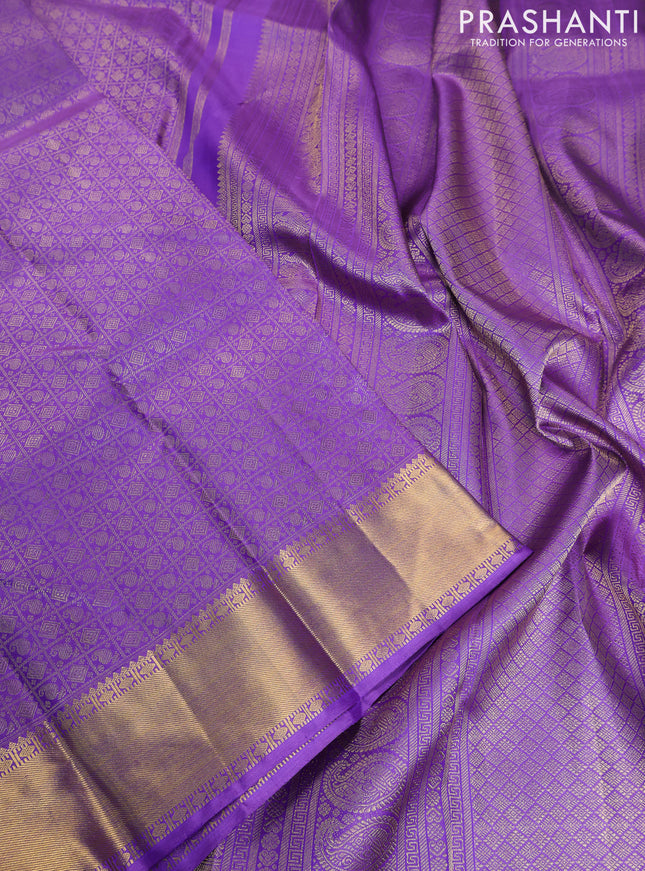 Pure kanchipuram silk saree lavender with allover zari woven brocade weaves and zari woven border