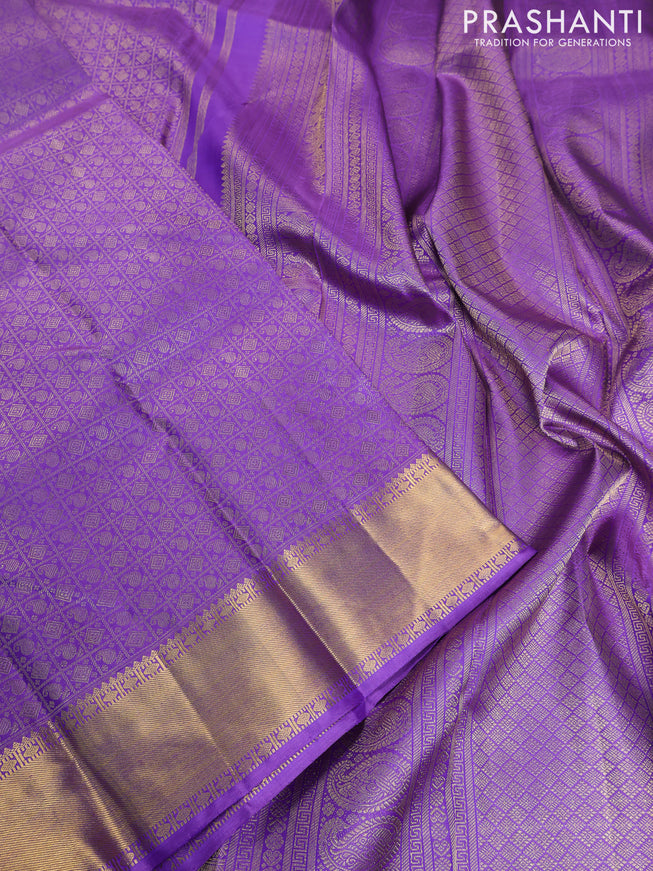 Pure kanchipuram silk saree lavender with allover zari woven brocade weaves and zari woven border