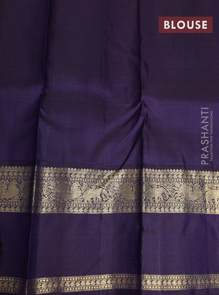 Pure kanchipuram silk saree light green and deep jamun with allover zari woven lakshadeepam pattern and rich zari woven simple border