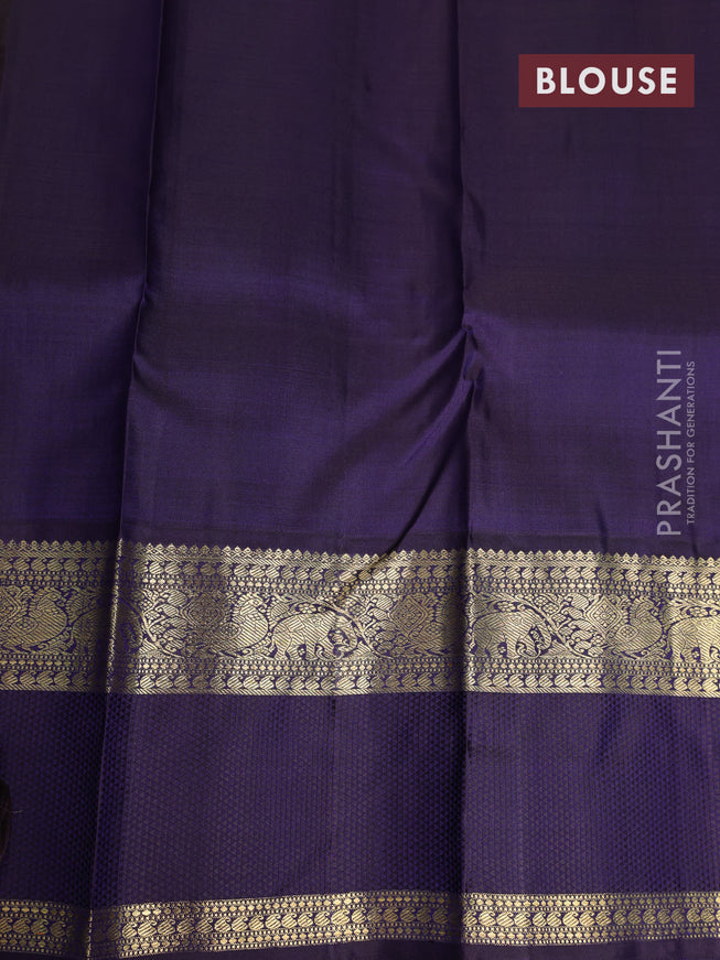 Pure kanchipuram silk saree light green and deep jamun with allover zari woven lakshadeepam pattern and rich zari woven simple border