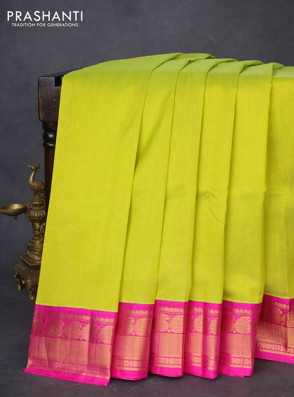 Kuppadam silk cotton saree lime green and pink with plain body and paisley zari woven border