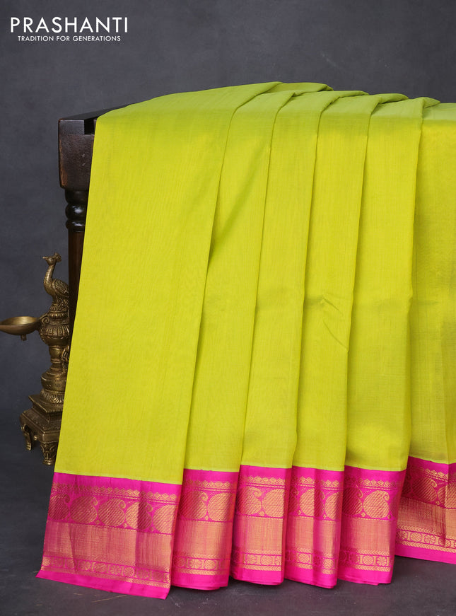 Kuppadam silk cotton saree lime green and pink with plain body and paisley zari woven border