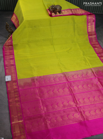 Kuppadam silk cotton saree lime green and pink with plain body and paisley zari woven border
