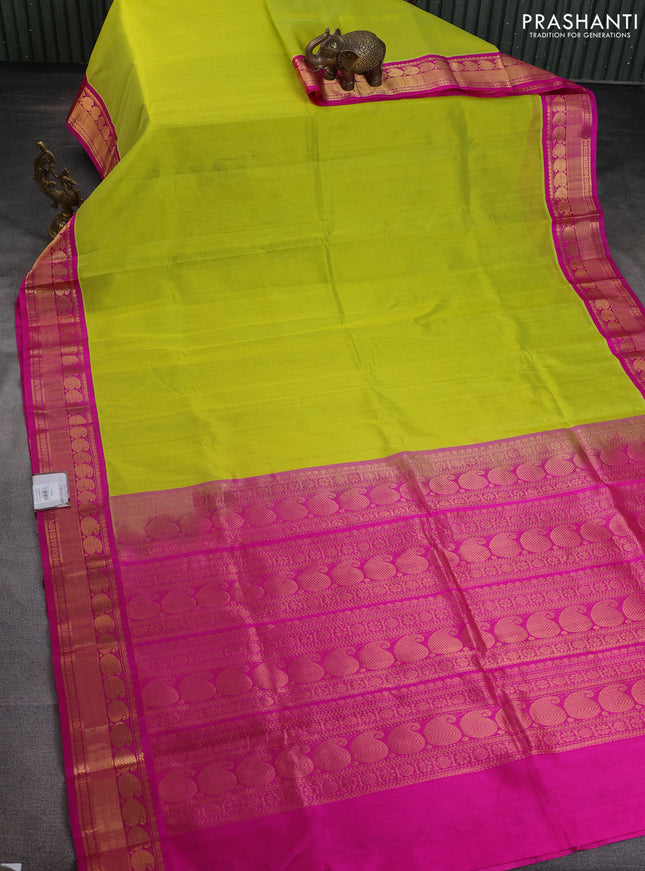 Kuppadam silk cotton saree lime green and pink with plain body and paisley zari woven border