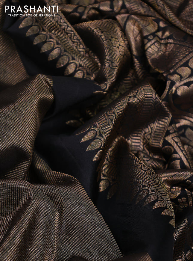 Pure kanchipuram silk saree black with allover zari woven brocade weaves and temple design zari woven border