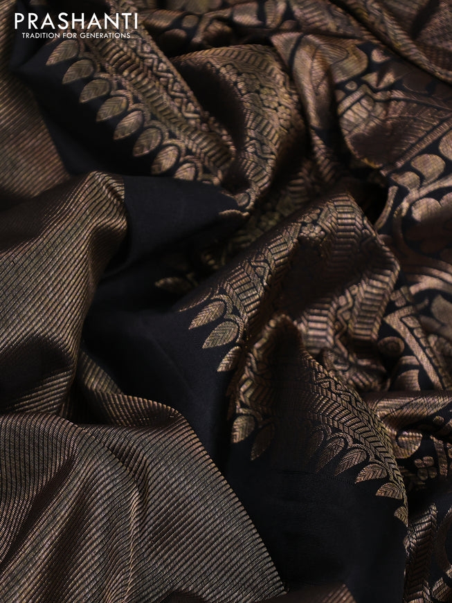 Pure kanchipuram silk saree black with allover zari woven brocade weaves and temple design zari woven border