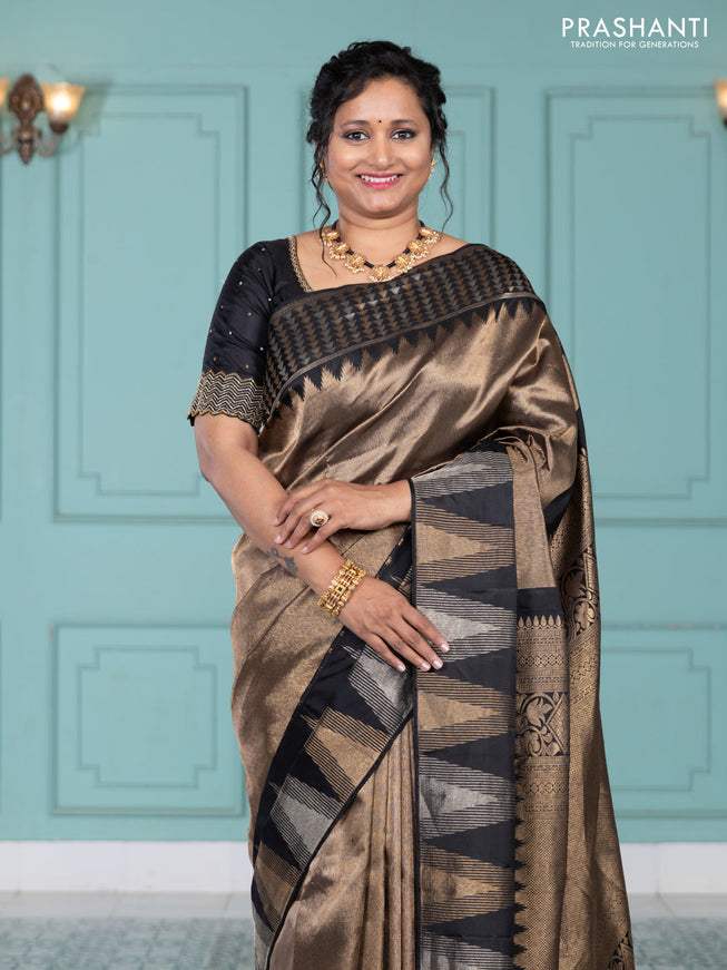Pure kanchipuram silk saree black with allover zari woven brocade weaves and temple design zari woven border