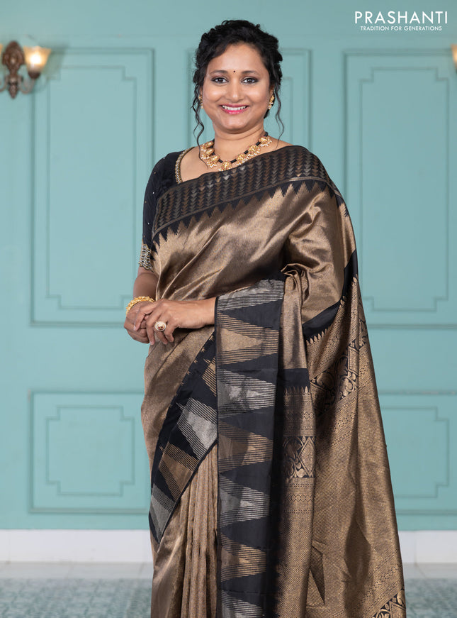 Pure kanchipuram silk saree black with allover zari woven brocade weaves and temple design zari woven border