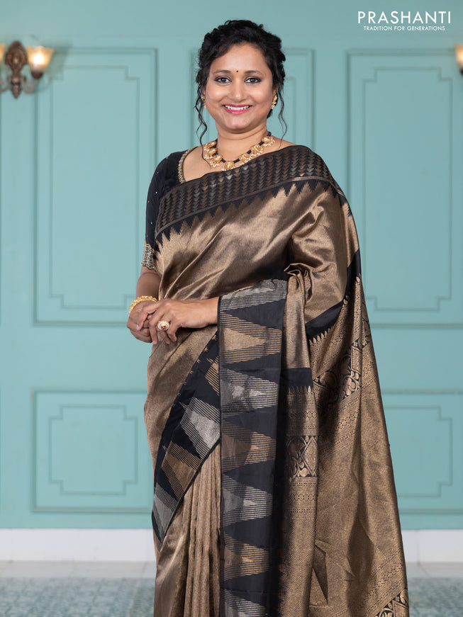Pure kanchipuram silk saree black with allover zari woven brocade weaves and temple design zari woven border