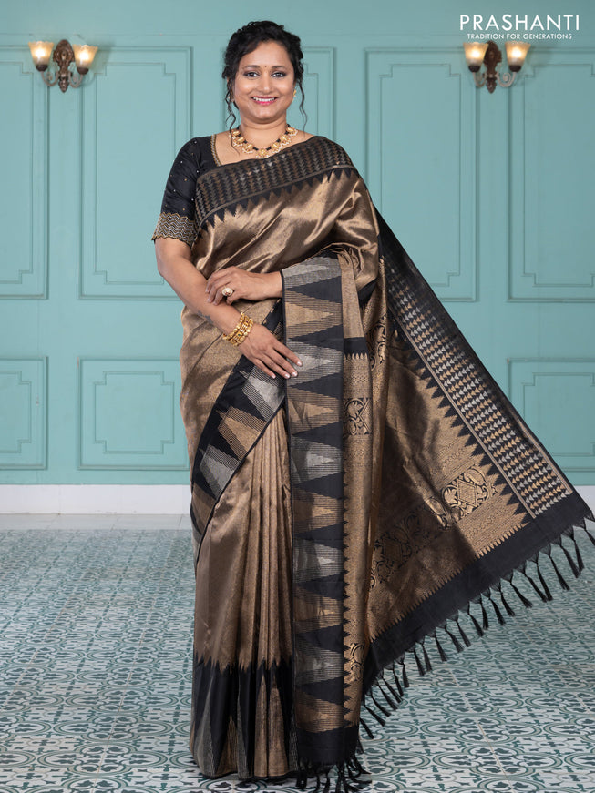 Pure kanchipuram silk saree black with allover zari woven brocade weaves and temple design zari woven border
