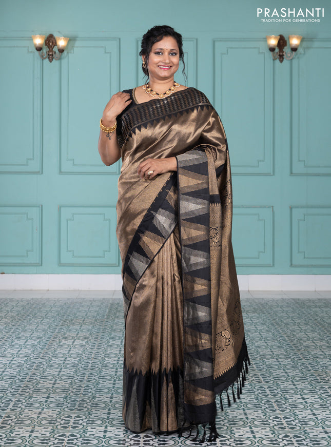 Pure kanchipuram silk saree black with allover zari woven brocade weaves and temple design zari woven border