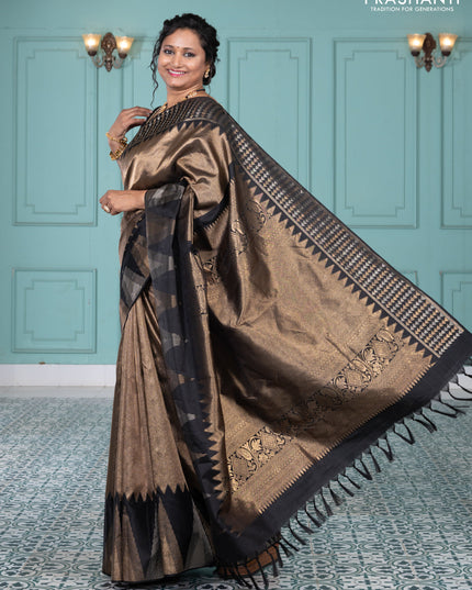 Pure kanchipuram silk saree black with allover zari woven brocade weaves and temple design zari woven border