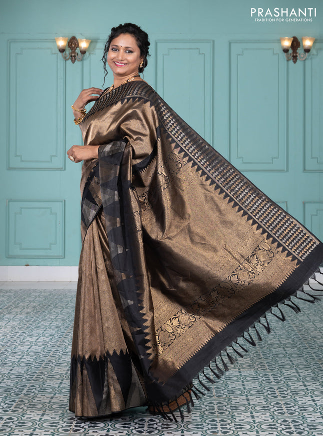 Pure kanchipuram silk saree black with allover zari woven brocade weaves and temple design zari woven border