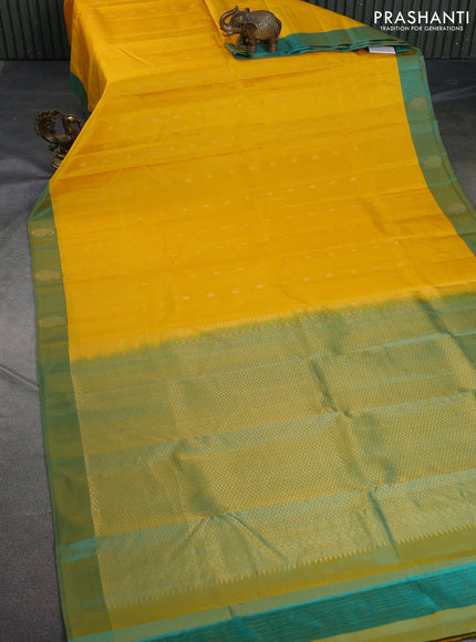 Pure kanchipuram silk saree yellow and dual shade of teal blue with allover zari woven buttas and zari woven butta border