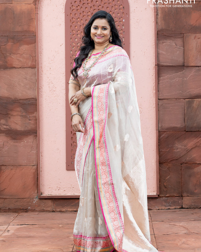 Banarasi tissue organza silk saree off white and pink with zari woven buttas and banarasi style border