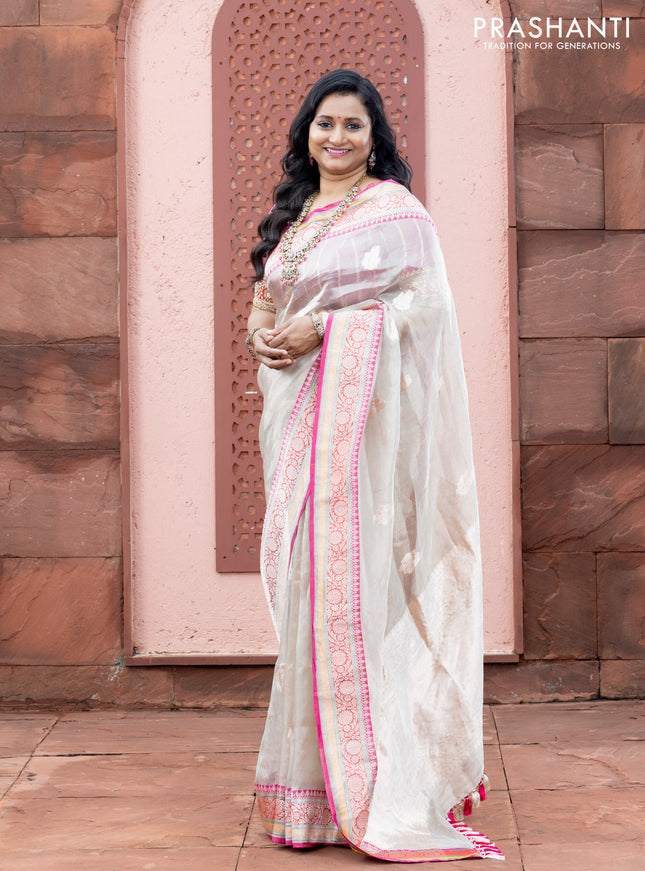 Banarasi tissue organza silk saree off white and pink with zari woven buttas and banarasi style border