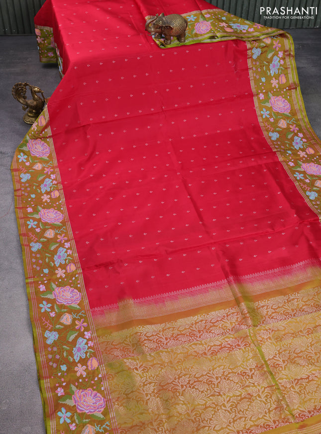 Pure soft silk saree red and dual shade of green with allover silver zari woven buttas and zari woven kutch embroidery