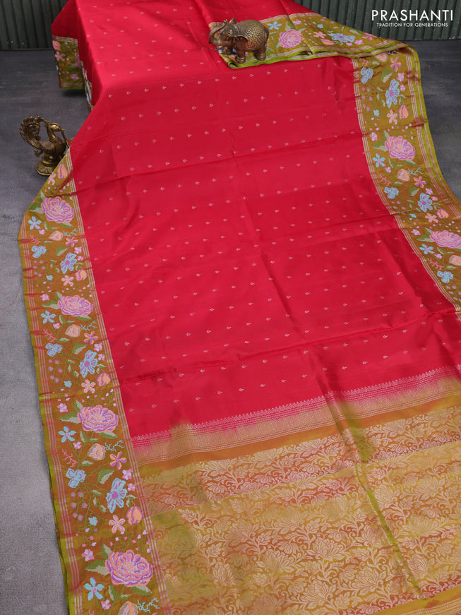 Pure soft silk saree red and dual shade of green with allover silver zari woven buttas and zari woven kutch embroidery