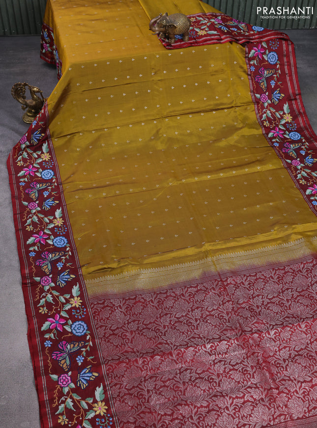 Pure soft silk saree mustard green and maroon with silver zari woven buttas and zari woven kutch embroidery