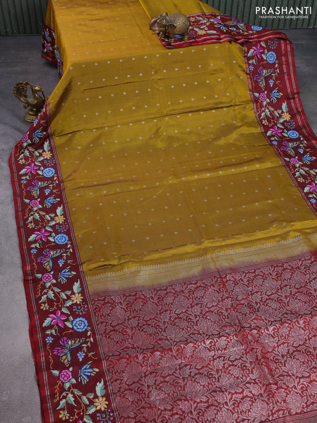 Pure soft silk saree mustard green and maroon with silver zari woven buttas and zari woven kutch embroidery
