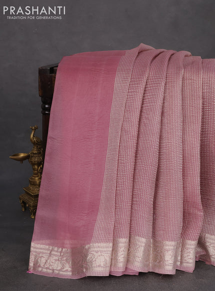 Pure organza partly silk saree pastel pink and pastel peach with allover silver zari weaves and silver zari woven border