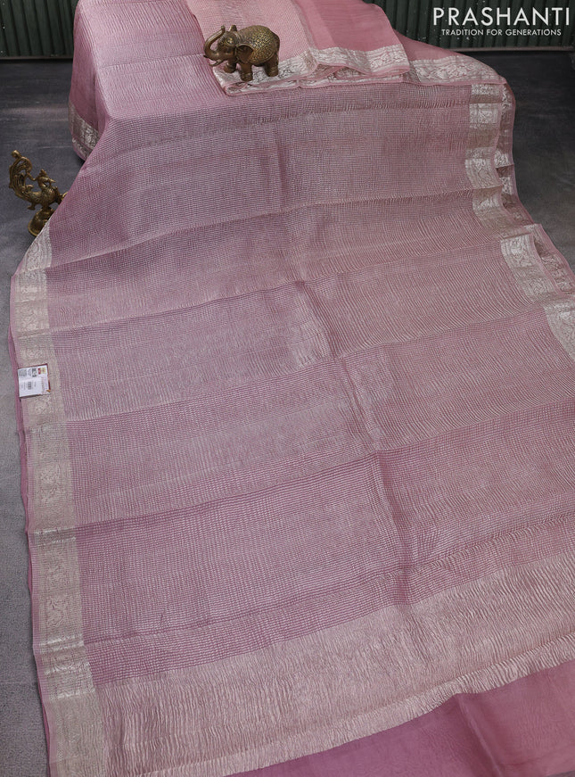 Pure organza partly silk saree pastel pink and pastel peach with allover silver zari weaves and silver zari woven border