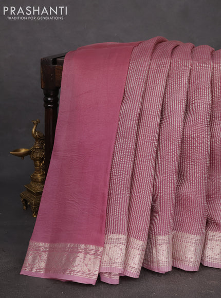 Pure organza partly silk saree pastel pink and pastel peach with allover silver zari weaves and silver zari woven border