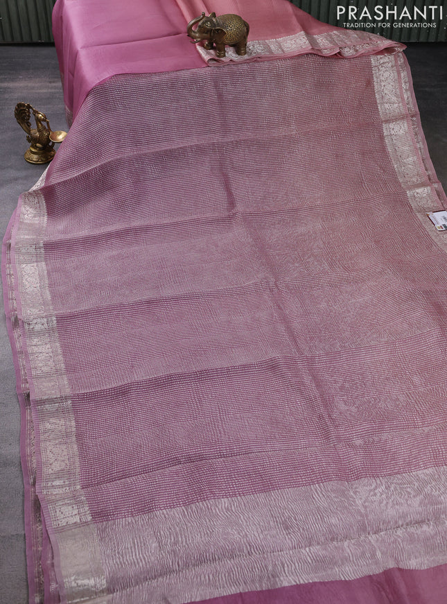 Pure organza partly silk saree pastel pink and pastel peach with allover silver zari weaves and silver zari woven border