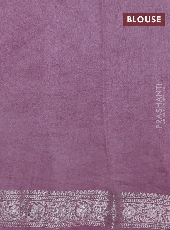 Pure organza partly silk saree pastel pink and pastel peach with allover silver zari weaves and silver zari woven border