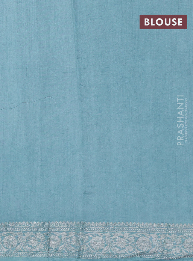 Pure organza partly silk saree pastel blue and grey with allover silver zari weaves and silver zari woven border