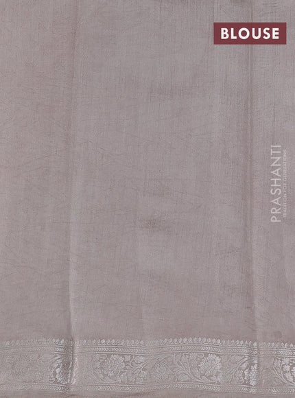 Pure organza partly silk saree grey shade and paste peach with allover silver zari weaves and silver zari woven border