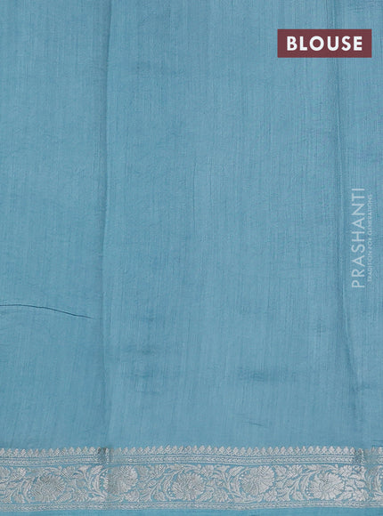 Pure organza partly silk saree grey and pastel blue with allover silver zari weaves and silver zari woven border