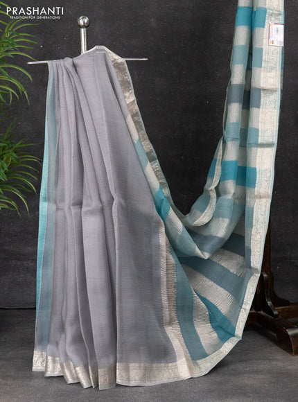 Pure organza partly silk saree pastel blue with silver zari stripe pattern and silver zari woven border