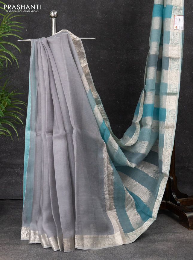Pure organza partly silk saree pastel blue with silver zari stripe pattern and silver zari woven border