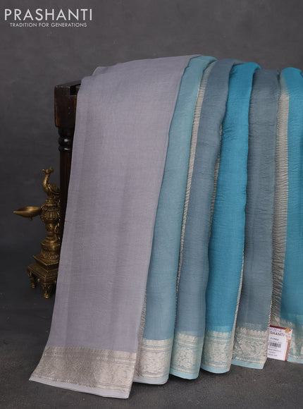 Pure organza partly silk saree pastel blue with silver zari stripe pattern and silver zari woven border