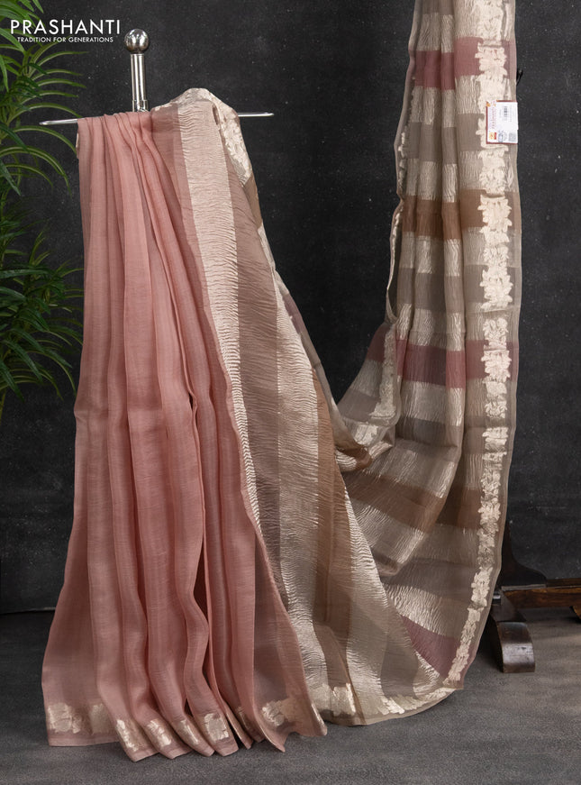Pure organza partly silk saree pastel peach and grey shade with silver zari stripe pattern and silver zari woven floral border