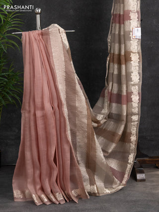 Pure organza partly silk saree pastel peach and grey shade with silver zari stripe pattern and silver zari woven floral border