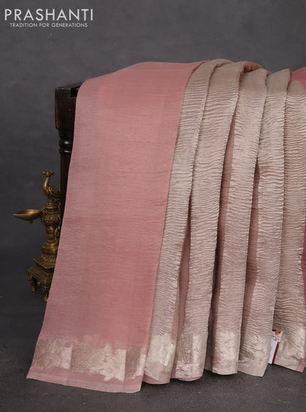 Pure organza partly silk saree pastel peach and grey shade with silver zari stripe pattern and silver zari woven floral border