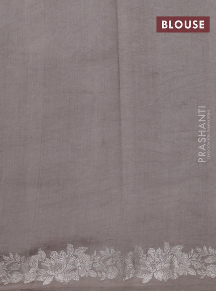 Pure organza partly silk saree pastel peach and grey shade with silver zari stripe pattern and silver zari woven floral border