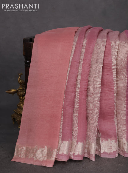 Pure organza partly silk saree pastel pink and pastel peach with silver zari stripe pattern and silver zari woven floral border