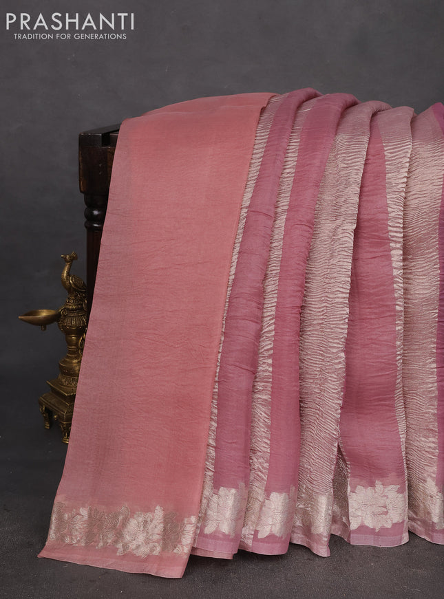 Pure organza partly silk saree pastel pink and pastel peach with silver zari stripe pattern and silver zari woven floral border