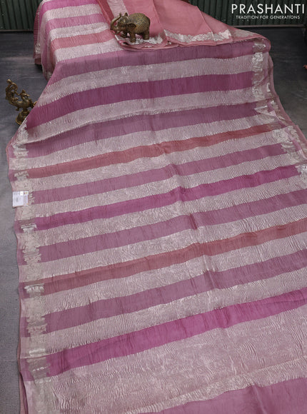 Pure organza partly silk saree pastel pink and pastel peach with silver zari stripe pattern and silver zari woven floral border