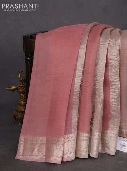 Pure organza partly silk saree pastel peach and grey shade with silver zari stripe pattern and silver zari woven border