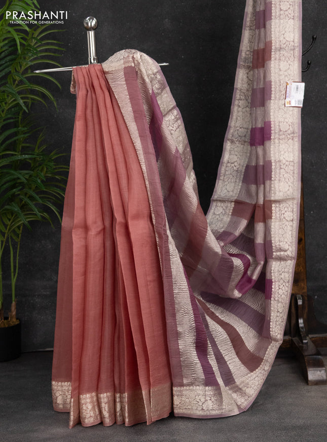 Pure organza partly silk saree pastel pink and pastel peach with silver zari stripe pattern and silver zari woven border